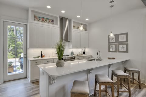 Gourmet kitchen is well stocked for cooking