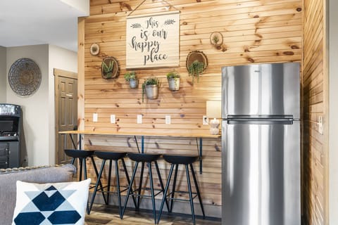 Lower seating area and second refridgerator.