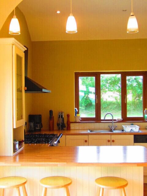 Kitchen and breakfast bar at Sea View Haven