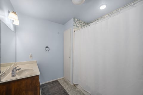 Combined shower/tub, hair dryer, towels, soap