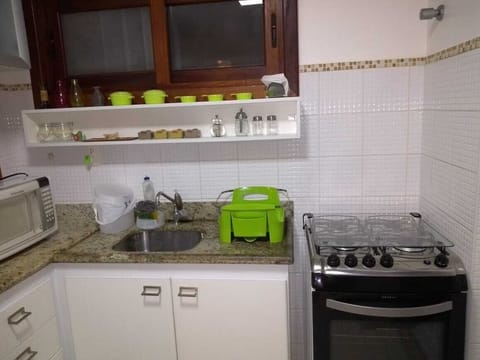 Fridge, microwave, stovetop, cookware/dishes/utensils