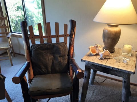 Rocking chair located in the living room.
