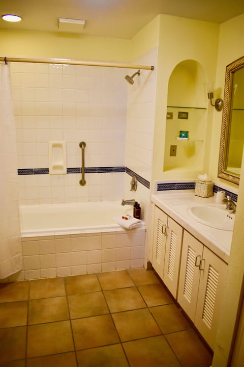 Combined shower/tub, hair dryer, towels, toilet paper