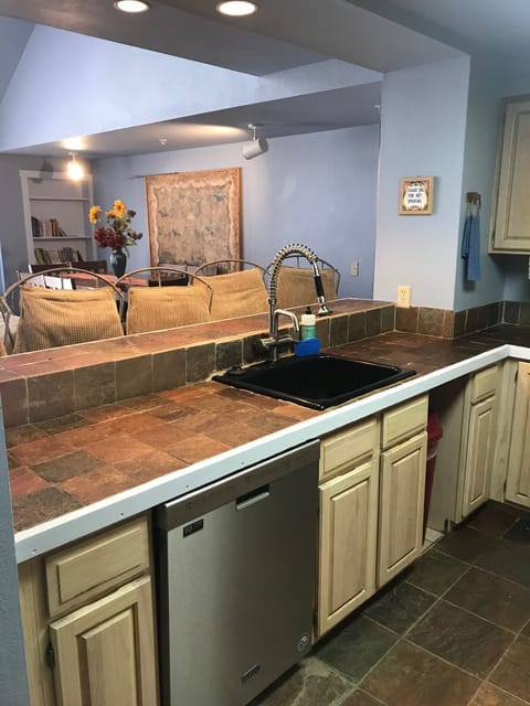 View through the galley kitchen of the dining area.