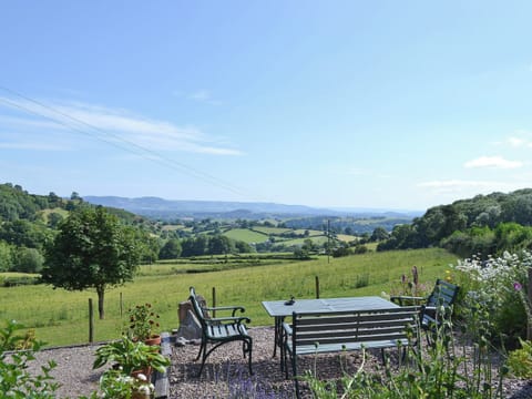 Sitting out area overlooking the beautiful Tanat Valley | Oak Cottage, Trefonen, near Oswestry