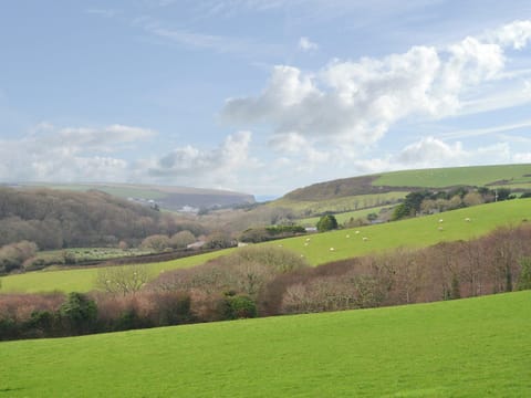 Far reaching views over the Cornish countryside to the sea | Porth View - Higher Lanvean Farm, St Mawgan, near Newquay