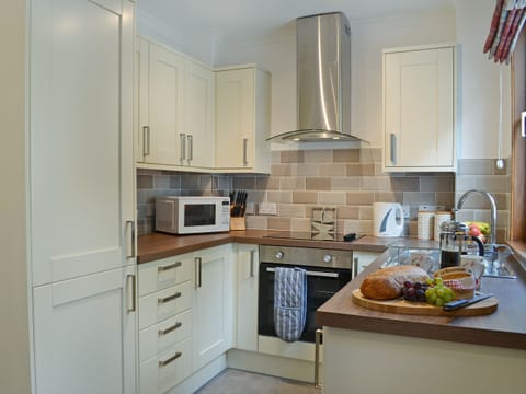 Exquisitely presented kitchen | 15 Cairnbaan Cottage, Cairnbaan, by Lochgilphead