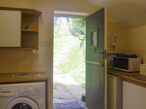 Compact kitchen and utility area | The Hayloft, Edge Hills, near Littledean