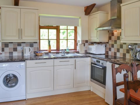 Well-appointed kitchen | Mill Cottage - Trimstone Manor Cottages, Trimstone, near Woolacombe