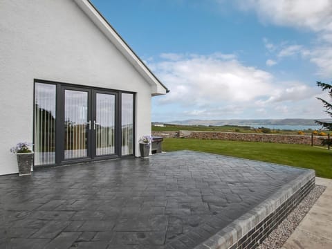 Relaxing patio area | Quarter Acre House - Dinduff Lodge and Quarter Acre House, Low Dinduff, near Stranraer