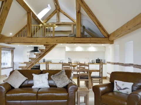 Spacious living area with additional mezzanine | Combe View - Lower North Radworthy Cottages, Heasley Mill, near South Molton