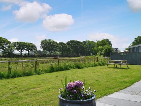 Lawned garden with countryside views | Crib Y Nantlle, Pontllyfni, near Caernarfon