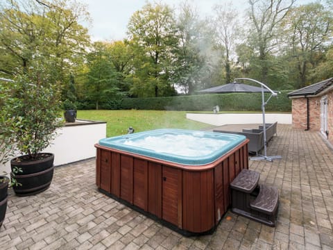 Relaxing hot tub on the terrace | The Lodge, North Duffield, near York