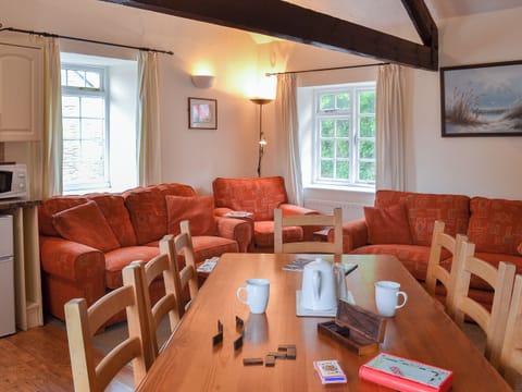 Beamed open plan living space | Granary - Trimstone Manor Cottages, Trimstone, near Woolacombe