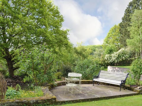 Verdant garden and grounds with seating area with wonderful views | Pear Tree House Annexe, Wooldale, near Holmfirth
