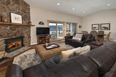 Living area with smart TV and gas fireplace.