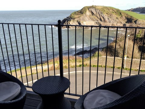 Balcony with seating area overlooking the sea | Apartment 6, Ilfracombe