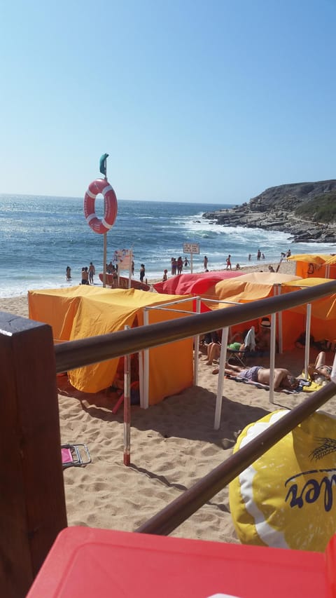 On the beach, sun loungers