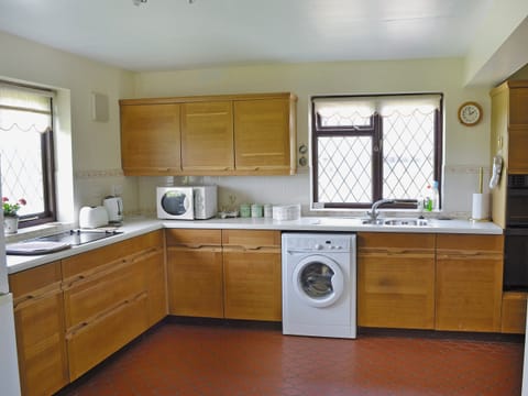 Fridge, microwave, oven, cookware/dishes/utensils