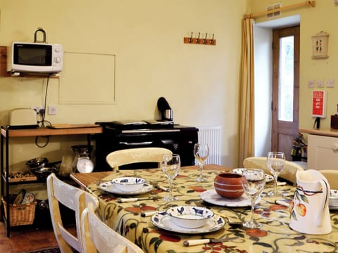 Farmhouse style kitchen with oil rayburn | The Granary, Lanton, near Jedburgh