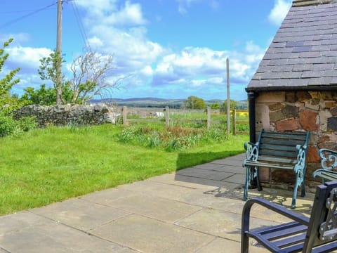 Sitting out area in the garden | Sandyhouse Cottage, Milfield, near Wooler