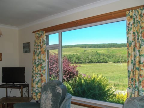 Wonderful countryside views from the living room | Lower Brae, Strath Oykel, by Ardgay