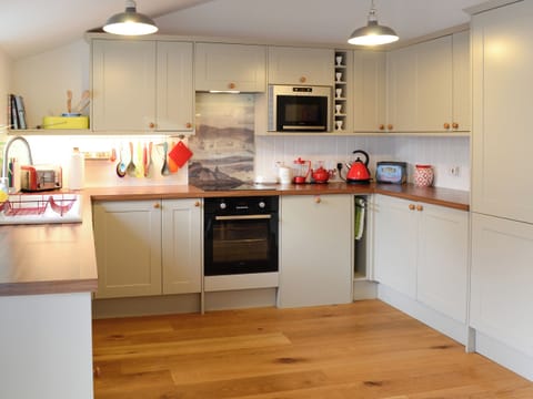 Lovely kitchen with sloping ceiling | The Byre - Rispond Estate, Rispond, near Durness
