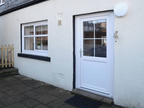 Private paved patio to the rear | Rosslyn Cottage, Portmahomack, near Tain