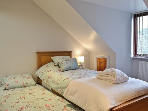 Single bedroom with additional single mattress | Dyffryn Haidd - Afan Holiday Cottages, llanafan/Aberystwyth