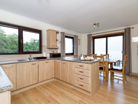 Spacious kitchen and dining area | Loch Duich Cottage, Inverinate, by Kyle