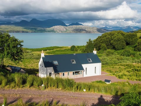 View of house looking down the Loch illustrates it’s seclusion and privacy.... | Tigh An Iasgair, Fearnbeg, near Applecross