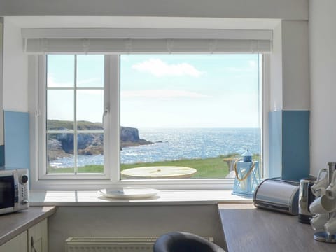 Magnificent view from the breakfast bar | Bwthyn Y Borth, Rhoscolyn, near Holyhead