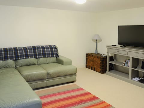 Ground floor living room with comfortable sofas | The Fish House - Rispond Estate, Rispond, near Durness