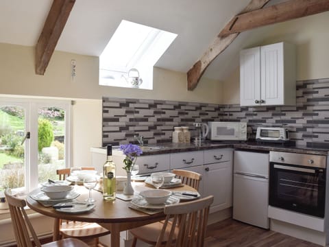 Kitchen with dining area | Upper Mill Barn - Pantgwyn Farm Cottages, White Mill, near Carmarthen
