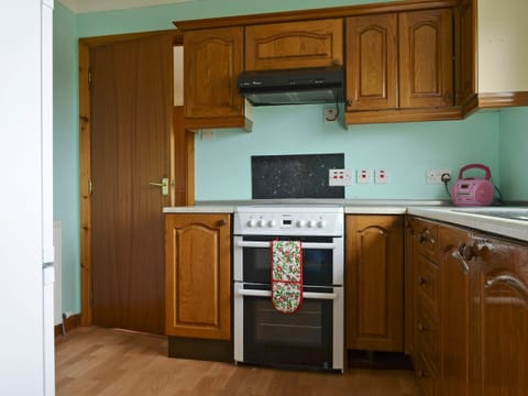 Well equipped kitchen | Bute Cottage, Daliburgh, South Uist