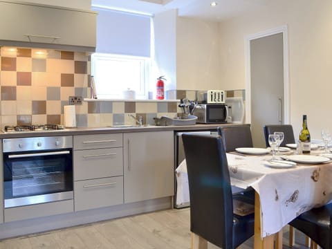 Well equipped kitchen/ dining area | Dovecote House, Wooler