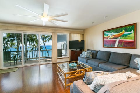 Relax in the living room with an oceanfront view.
