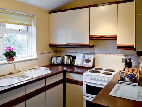 Microwave, highchair, cookware/dishes/utensils, freezer