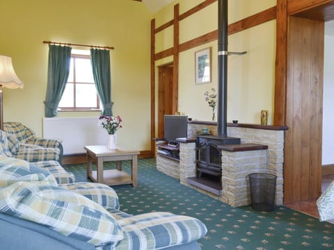 Characterful living and dining room with wood burner | Dwyfor - Aberkin Farm, Llanystumdwy, near Criccieth