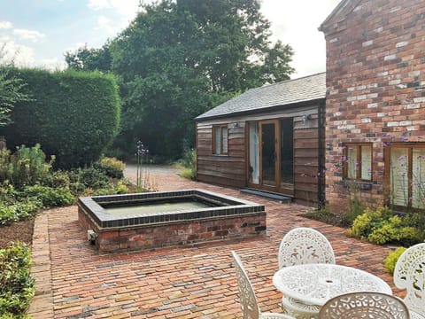 Lovely courtyard with sitting-out area | The Hayloft, Kidderminster