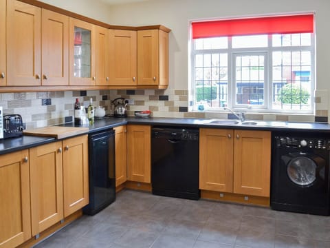 Lovely tile-floored kitchen | Bay House, Filey