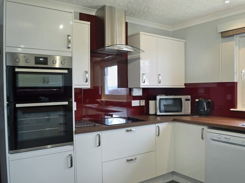 Tastefully modernised kitchen | Tall Pines, Carrbridge