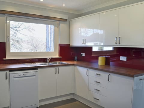 Tastefully modernised kitchen | Tall Pines, Carrbridge