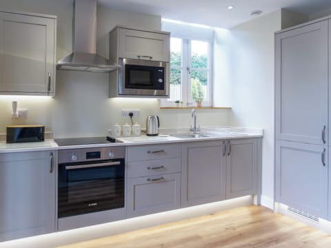 Well fitted and appointed kitchen | The Coaches - The Abbey Coach House, St. Mary’s Park, Windermere