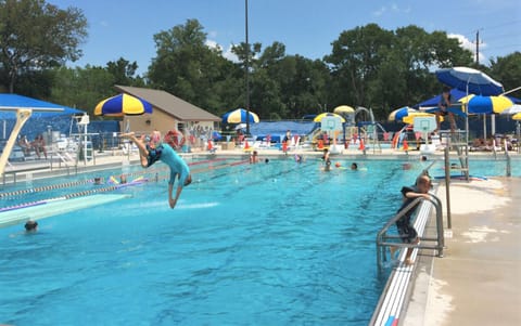 The nearby pool features dive board, swim lanes, beach end and splash pad!