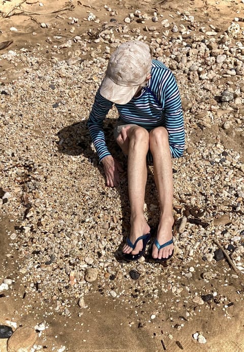 On the beach, sun loungers, beach towels