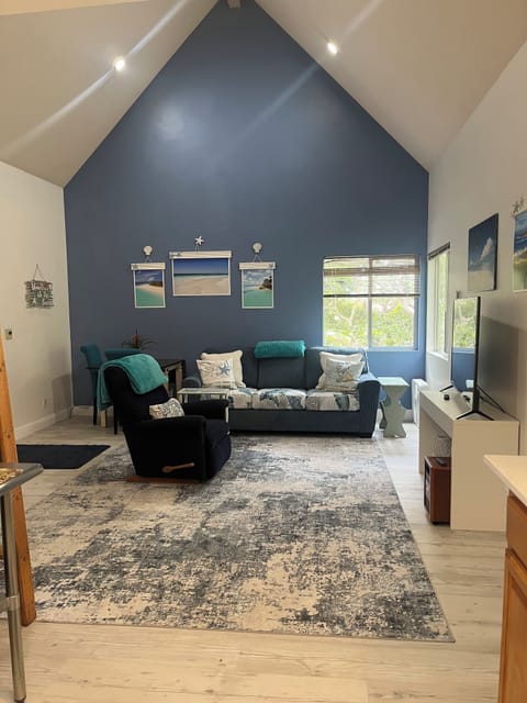 Living area:  queen sleeper sofa, recliner & dining area