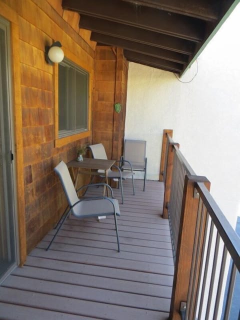 Deck with deck chairs and table.