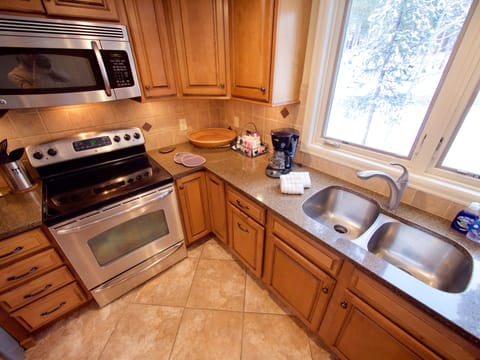 Fully Equipped Kitchen - Newly remodeled, fully equipped kitchen with an open dining room area.