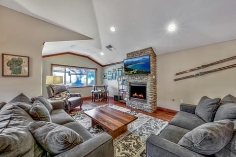 Cozy up around the fire in this comfortable and contemporary living space. Catch up with loved ones or watch a movie on the large mounted HDTV